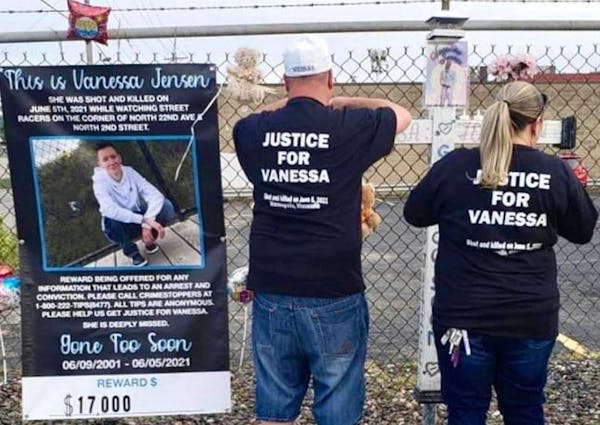 Travis and Rachel Jensen tended to the memorial to their daughter Vanessa at a north Minneapolis intersection where she was fatally shot while watchin