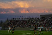 A beautiful sunset over TCO Stadium after a stormy afternoon in the second half.