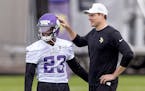 Vikings cornerback Andrew Booth Jr. with head coach Kevin O’Connell at the team’s rookie minicamp in May. 