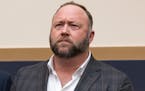 Infowars host and conspiracy theorist Alex Jones appears at Capitol Hill in Washington on Dec. 11, 2018.