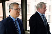 Former Minneapolis police officer Tou Thao, left, and his attorney Robert Paule arrived for sentencing for violating George Floyd’s civil rights at 