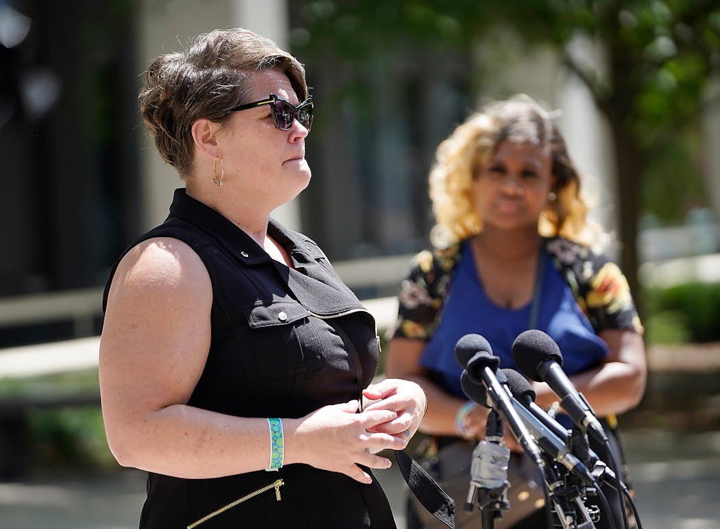 After the sentencing of former Minneapolis police officers J. Alexander Kueng and Tou Thao for violating George Floyd’s civil rights Floyd’s partner Courteney Ross, left, faced the media.