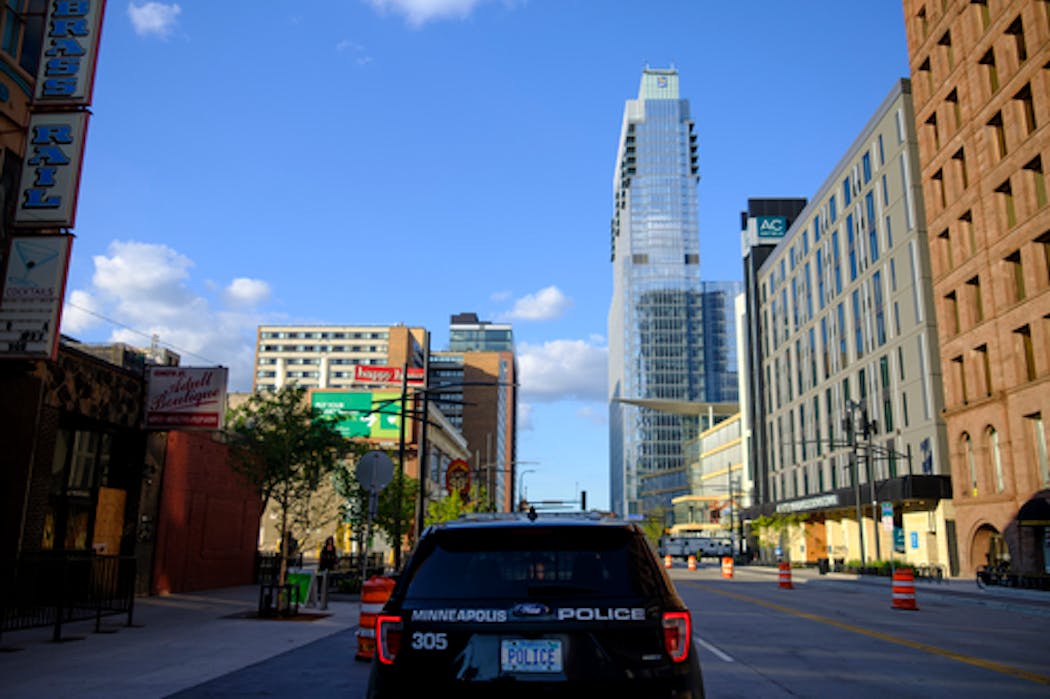 A Minneapolis police vehicle was parked along Hennepin Avenue near 4th Street on Friday.