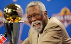 Bill Russell (shown in 2009) led the Boston Celtics to 11 NBA championships in 13 years, including the final two as player-coach. He was the first Bla