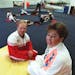 Gabor Deli, left, and his wife, Katalin, in their Olympic Gymnastics Academy. The two also coached together at the University of Minnesota.
