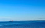 The cargo ship Maxima rests on Lake Superior Monday night.