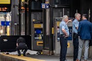 Police investigated a fatal shooting at the 5th and Nicollet Avenue light rail station in Minneapolis, Minn., on Tuesday. 