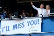 Los Angeles Dodgers announcer Vin Scully, with wife Sandra Hunt, waved to fans after the team’s 10th-inning victory against the Colorado Rockies on 