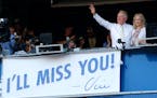 Los Angeles Dodgers announcer Vin Scully, with wife Sandra Hunt, waved to fans after the team’s 10th-inning victory against the Colorado Rockies on 