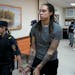 WNBA star and two-time Olympic gold medalist Brittney Griner is escorted from a court room after her last words, in Khimki just outside Moscow, Russia