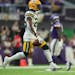 Packers starting safety Darnell Savage (shown vs. the Vikings in November of 2021) injured his hamstring at the team’s “Family Night” practice a