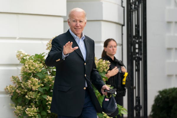 President Joe Biden waves as he walk to board Marine One on the South Lawn of the White House in Washington, on his way to his Rehoboth Beach, Del., h