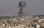 Smoke rises following Israeli airstrikes on a building in Gaza City’s Shijaiyah neighborhood, Sunday, Aug. 7, 2022.