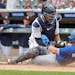 Twins catcher Gary Sanchez tagged out the Blue Jays’ Whit Merrifield, trying to score on a sacrifice fly by Cavan Biggio in the tenth inning, but th