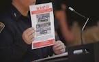 A poster showing surveillance images of a car that police say may provide a lead in the cases of four Muslim men that were all recently killed, at a n