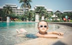 A boy on vacation at the Hilton Sanya Yalong Bay Resort & Spa in Sanya, a burgeoning tourist mecca on the Chinese island of Hainan, Sept. 15, 2016. Au