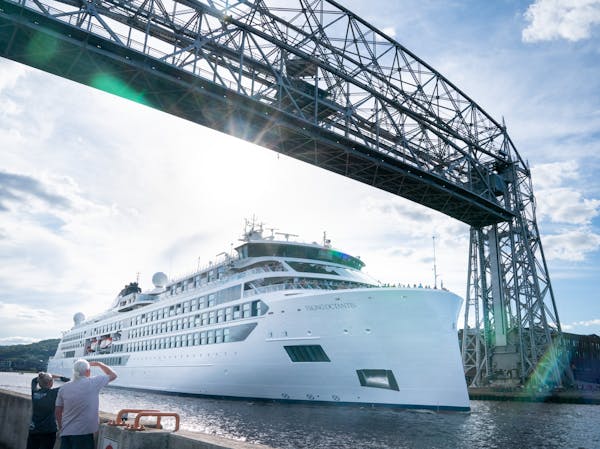 The Viking Ocantis of Vikings Cruises sails under the Aerial Lift Bridge on Lake Superior Monday, July 25, 2022 at Canal Park in Duluth, Minn.   ]