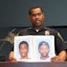 At a news conference Monday, Bloomington Police Chief Booker Hodges held photos of Shamar Alon Ramon Lark, left, and Rashad Jamal May, sought in conne