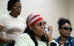 FILE | Essie McKenzie, flanked by her mother Shenna Galloway and sister Alexis McKenzie asked for prayers for her daughters who where trapped in a van