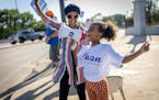 U.S. Rep. Ilhan Omar’s youngest daughter, Ilwad Hirsi, 10, joined her mother during a voter engagement event on the corner of Broadway and Central A