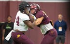 Gophers running back Mohamed Ibrahim (24) bounced off linebacker Mariano Sori-Marin during the football team’s open practice Saturday at Athletes Vi