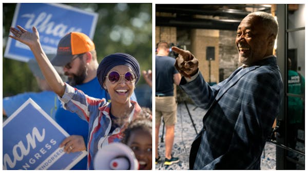 Rep. Ilhan Omar, left, and Don Samuels campaigning on Tuesday during the primary voting. 