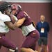 Gophers running back Mohamed Ibrahim (24) bounced off linebacker Mariano Sori-Marin during the football team’s open practice Saturday at Athletes Vi