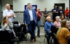 Supporters clapped for GOP congressional candidate Brad Finstad after his campaign announced his primary victory during an election night party Tuesda