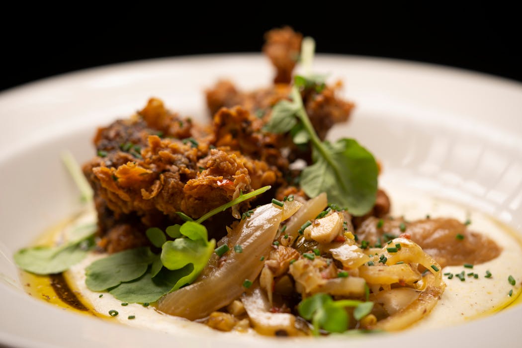Crispy Brown Butter Chicken with Riverbend Farms Polenta is on the menu at Tosca.
