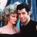 Olivia Newton-John — after her character’s transformation — with John Travolta in the 1978 movie musical “Grease.”