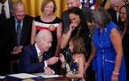 President Joe Biden gave the pen he used to sign the PACT Act of 2022 to Brielle Robinson, daughter of Sgt. 1st Class Heath Robinson, who died of canc