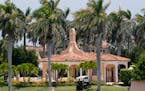 Security moves in a golf cart at former President Donald Trump’s Mar-a-Lago estate, Tuesday, Aug. 9, 2022, in Palm Beach, Fla.