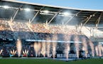 Pyrotechnics lights up the field during the opening ceremony of the MLS All-Star Game against LIGA MX.