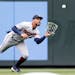 Byron Buxton has spent little time patrolling center field for the Twins of late as the team tries to ease the toll on his ailing right knee.