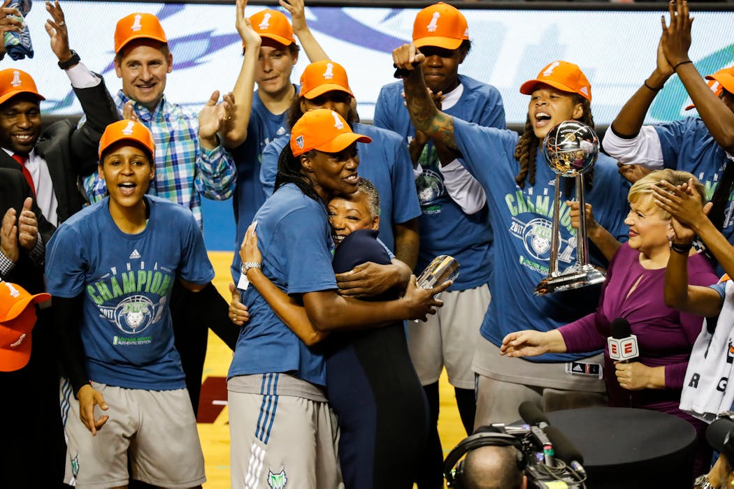 Fowles hugging WNBA president Lisa Borders after receiving the 2017 Finals MVP trophy.