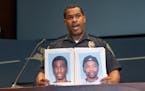 At a news conference Monday, Bloomington Police Chief Booker Hodges held up photos of Shamar Alon Lark, left, and Rashad Jamal May, sought in connecti