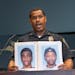 At a news conference Monday, Bloomington Police Chief Booker Hodges held up photos of Shamar Alon Lark, left, and Rashad Jamal May, sought in connecti