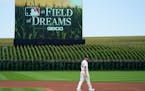 Cubs starter Drew Smyly walked on the field before striking out nine Reds in five innings in Chicago’s 4-2 victory in the “Field of Dreams” game