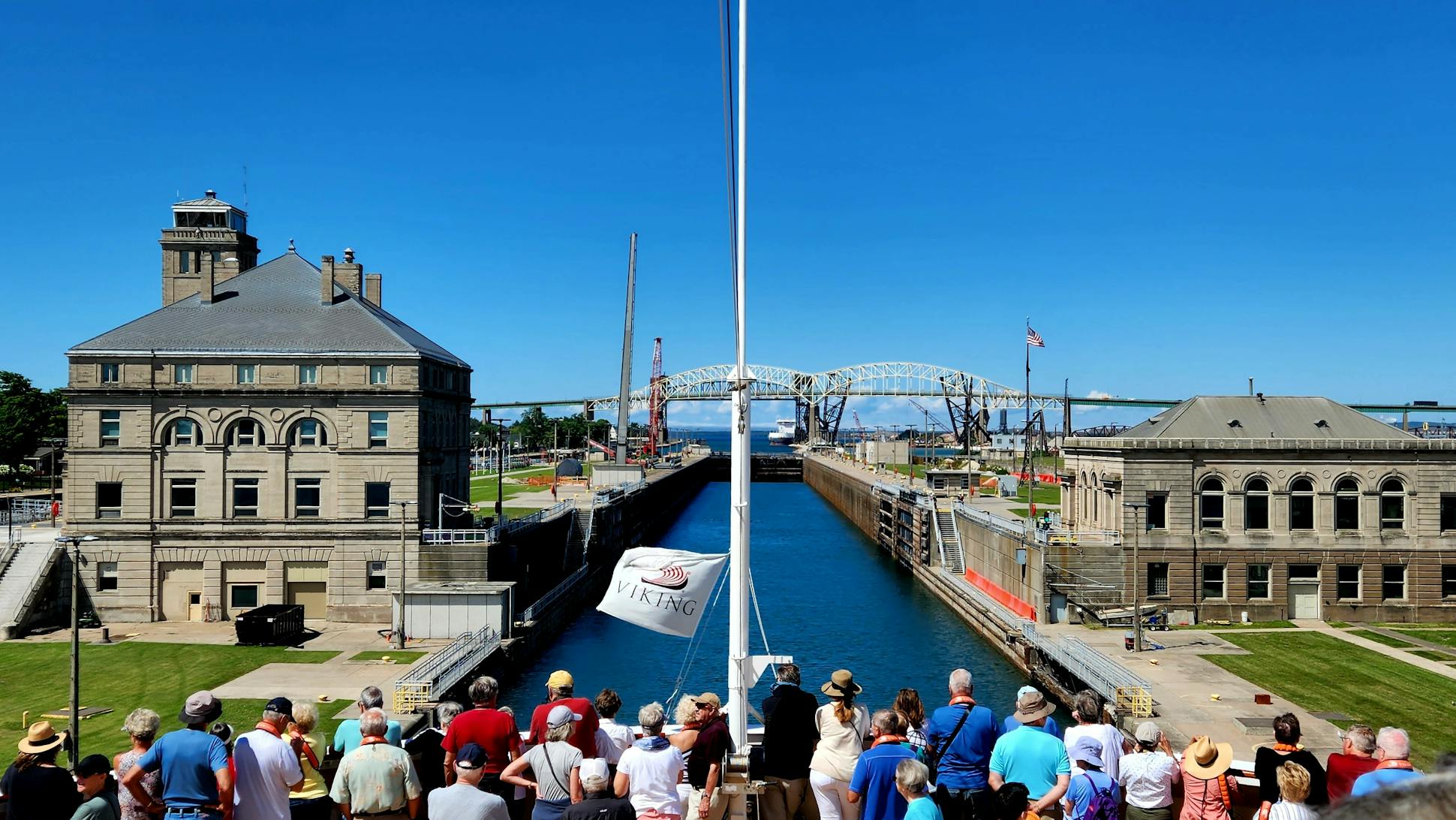 Passengers watched from the bow of Viking Octantis as the vessel slowly entered the Poe Lock in Sault Ste. Marie, Mich., on its way to Lake Superior.