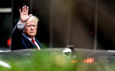 Former President Donald Trump waved as he left Trump Tower in New York City on Wednesday on his way to the New York attorney general’s office for a 