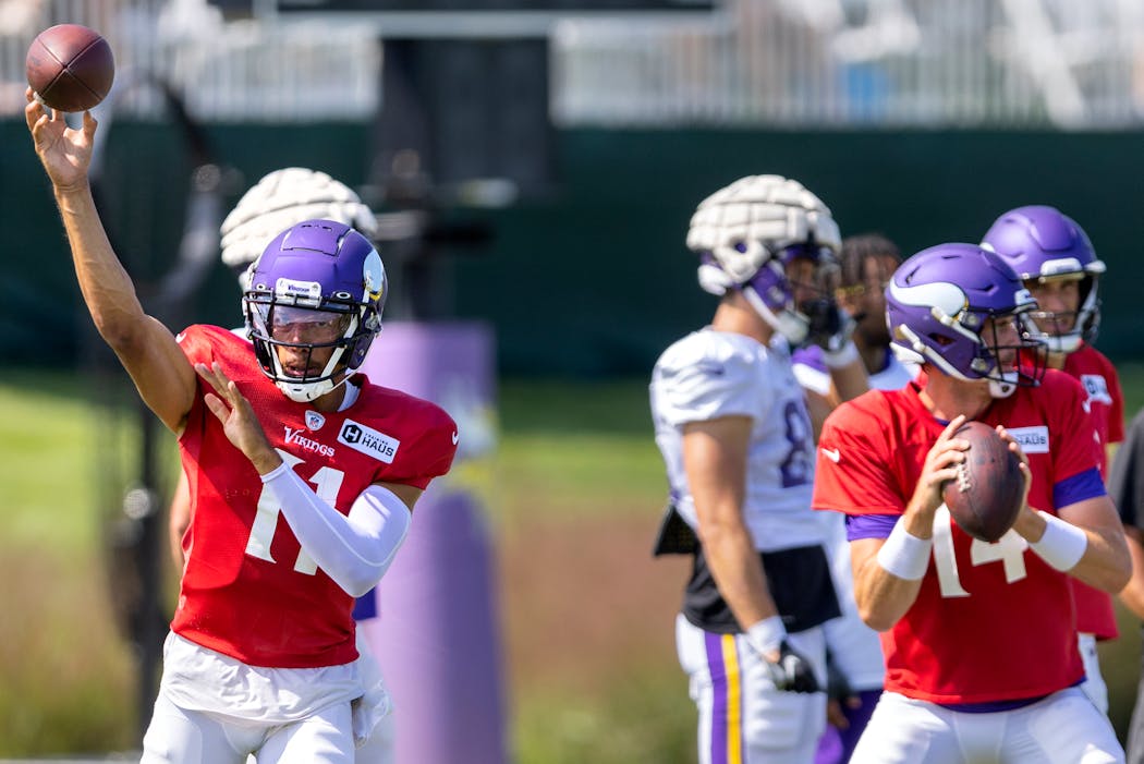 “I could tell he put a lot of time into it during the summer, because he came back and he had fixed a lot of those things,” Vikings offensive coordinator Wes Phillips said of Kellen Mond (left).