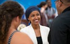 U.S. Rep. Ilhan Omar speaks to constituents after a town hall meeting in Robbinsdale.
