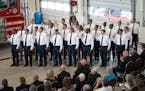 Cadets are sworn in, Friday, Aug. 12, 2022, Minneapolis, Minn. The Minneapolis Fire Department welcomes 23 new firefighters to the cadet class of 2022