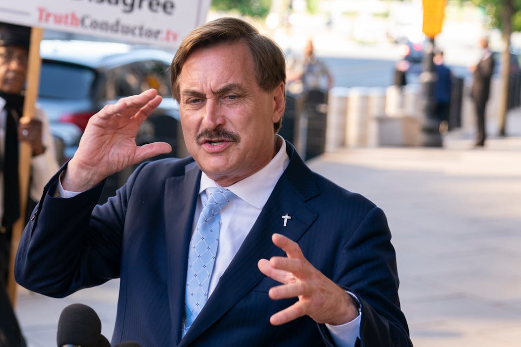 Dominion has also filed separate lawsuits against Rudy Giuliani, Sidney Powell and MyPillow CEO Mike Lindell, shown speaking to reporters outside federal court in Washington, June 24, 2021.
