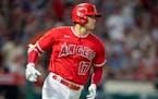 Shohei Ohtani watched his eighth-inning home run get just past a leaping Byron Buxton on Saturday, the first run in the Angels’ late-inning comeback