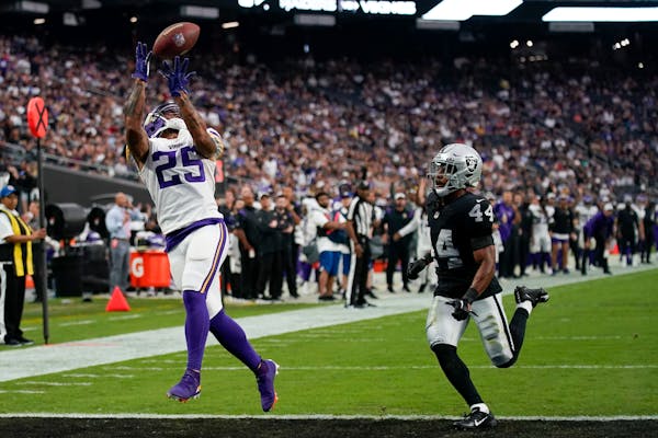 Vikings wide receiver Albert Wilson caught a touchdown pass over Raiders cornerback Bryce Cosby during the second half Sunday.