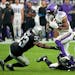 Vikings running back Kene Nwangwu tried to gallop past Raiders cornerback Cre’Von LeBlanc and safety Roderic Teamer during the first half Sunday. Nw