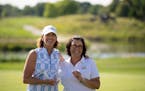 Thea Keamy of Land O’Lakes presented Juli Inkster with her trophy on Sunday.