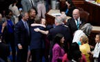 Members of the House of Representatives celebrated after the vote to approve the Inflation Reduction Act at the Capitol in Washington, Friday, Aug. 12