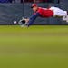 Twins center fielder Byron Buxton dived for a ball on Monday night during his team’s victory over Kansas City at Target Field.